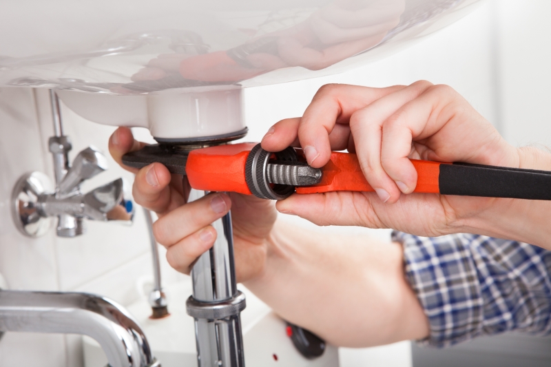 Emergency plumber attending a job in Highgate
